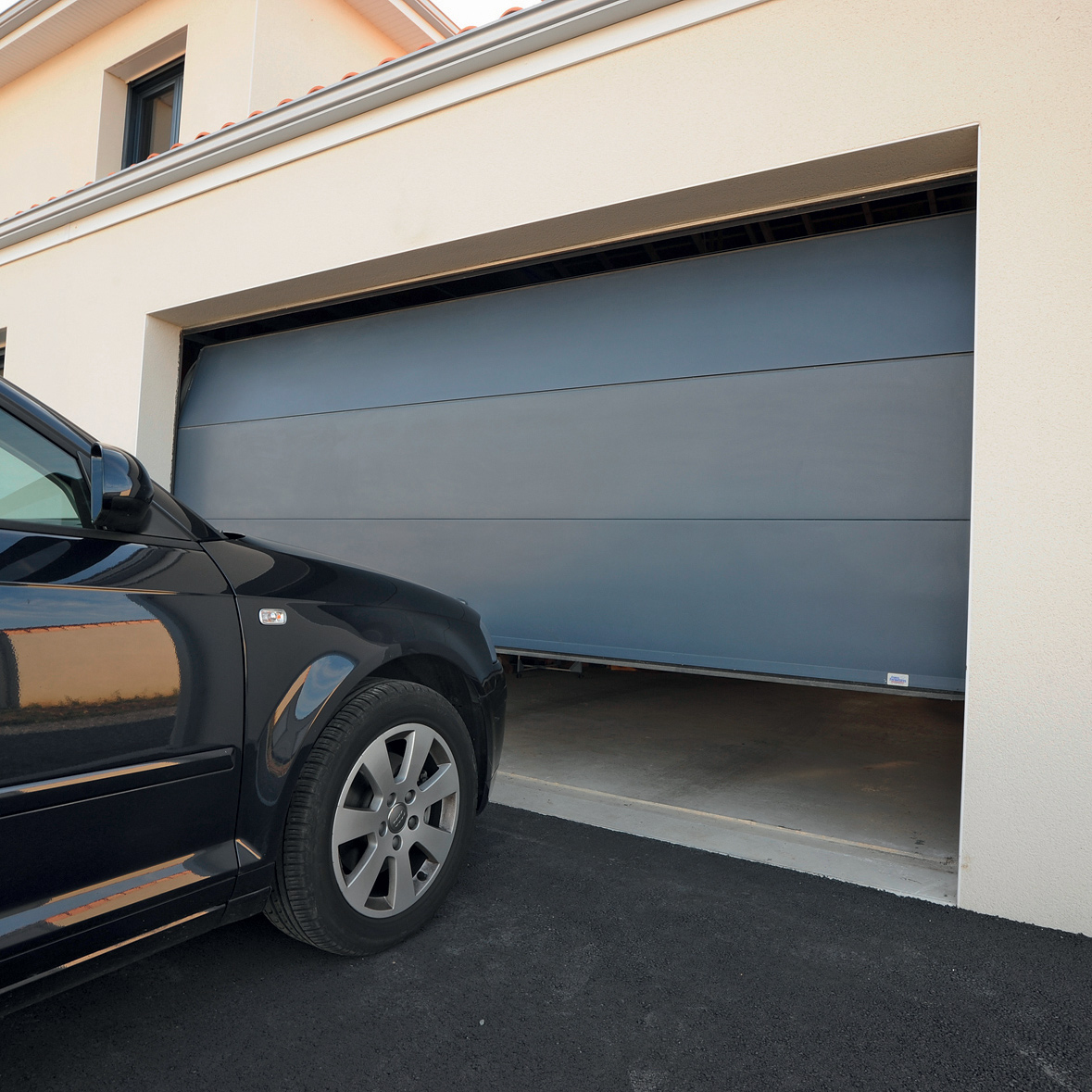 Porte de garage sectionnelle à ouverture plafond